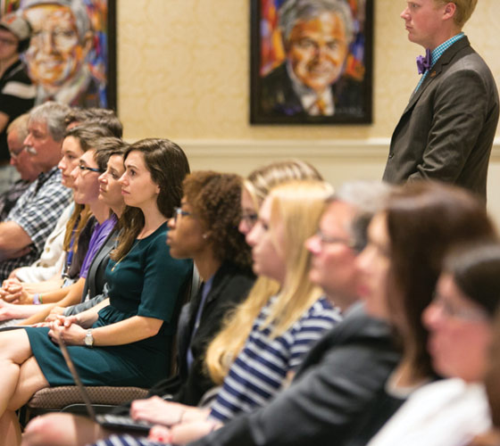 Students listening to a speaker